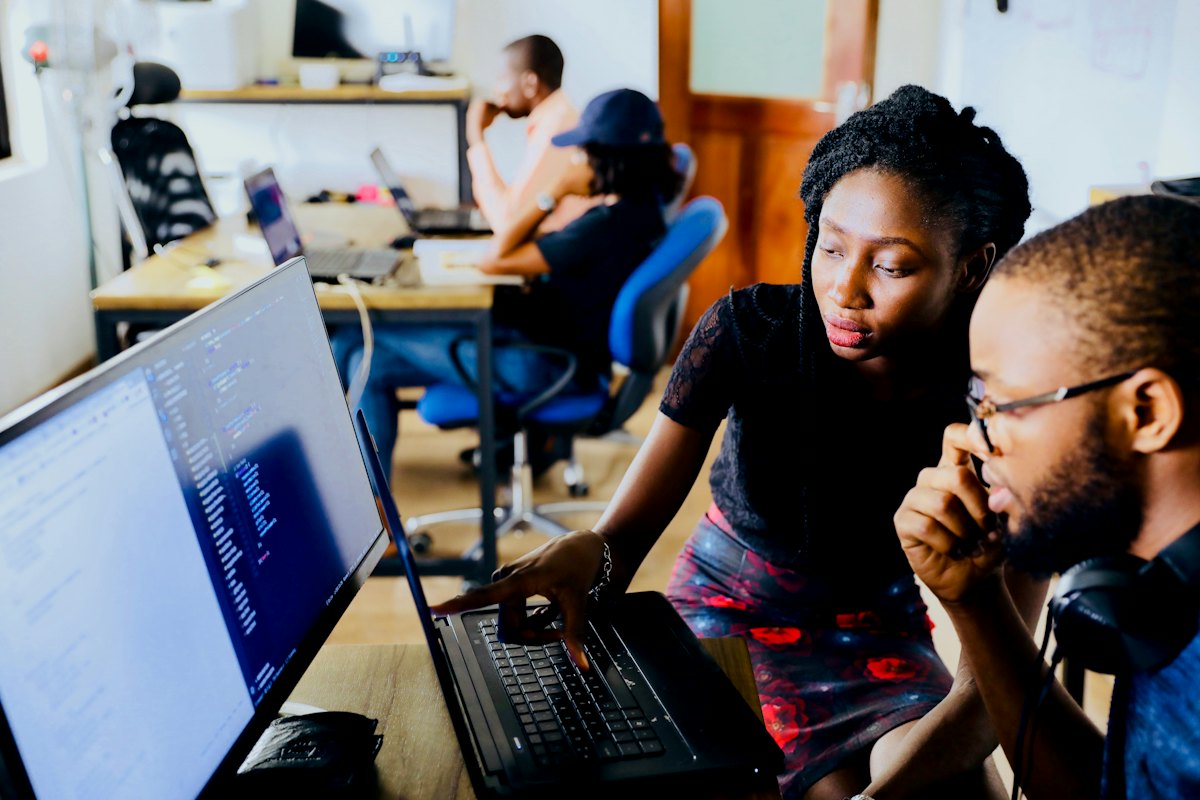 Students working together at computers